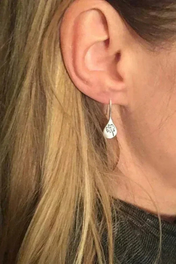 Elegante Silberohrringe im Dandelion-Blatt-Design