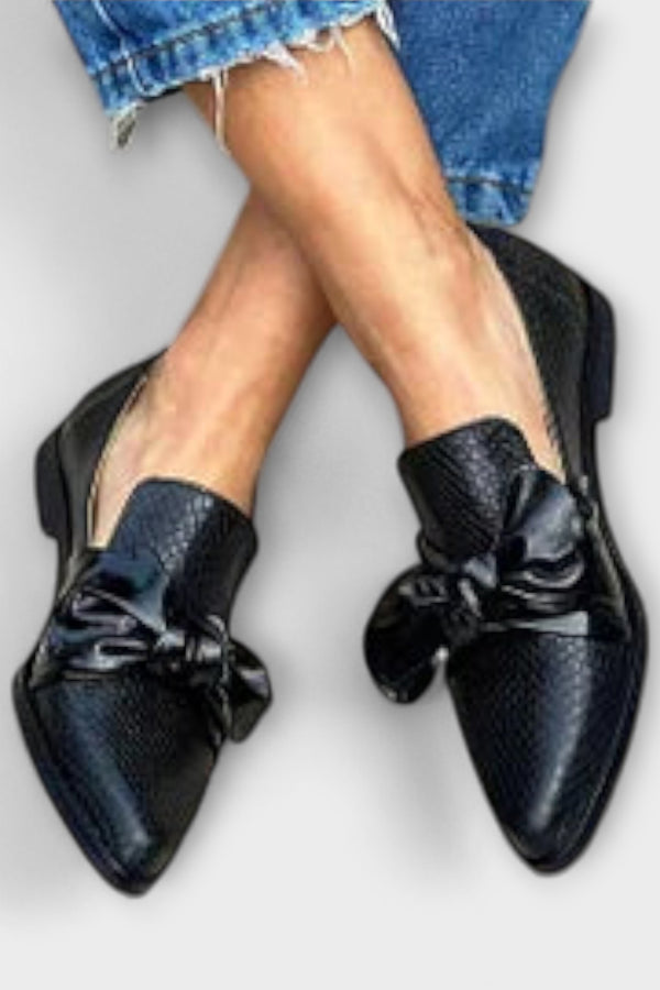 Zinnia – Loafer mit Schlangenhautmuster und Schleifendetail